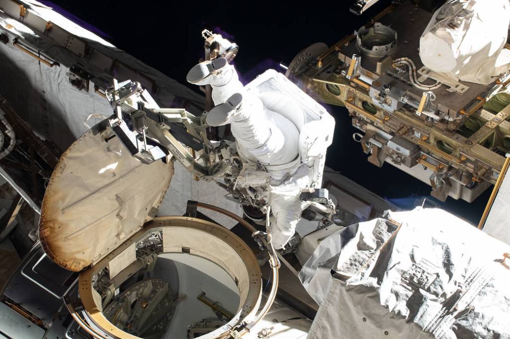 Spacewalker and NASA astronaut Christina Koch exits the Quest airlock