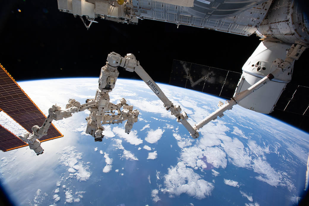 The Canadarm2 robotic arm with its robotic hand Dextre