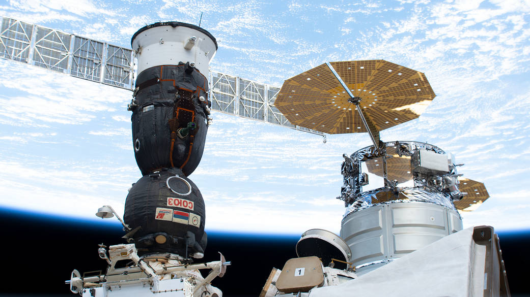 The Russian Soyuz and U.S. Cygnus spaceships