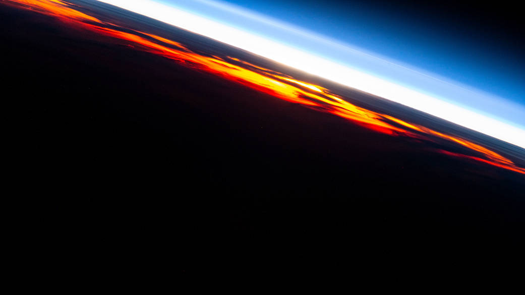 Flying into an orbital sunset above the Pacific Ocean