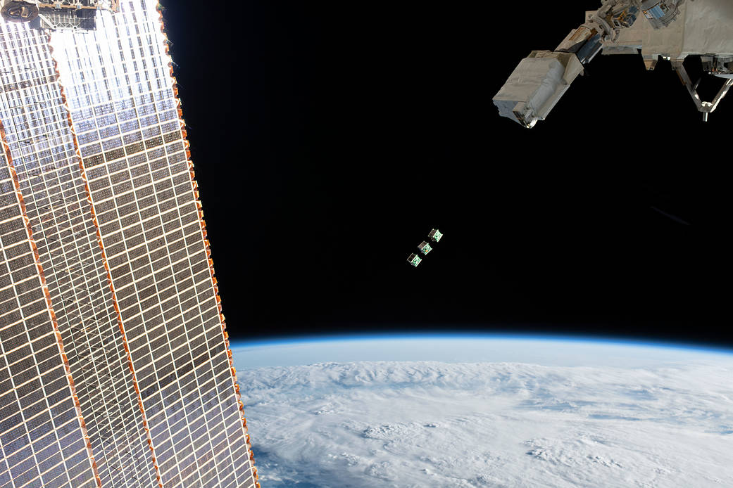 Three CubeSats are ejected outside the Kibo laboratory module