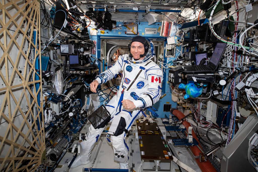 Astronaut David Saint-Jacques wears his Sokol launch and entry suit