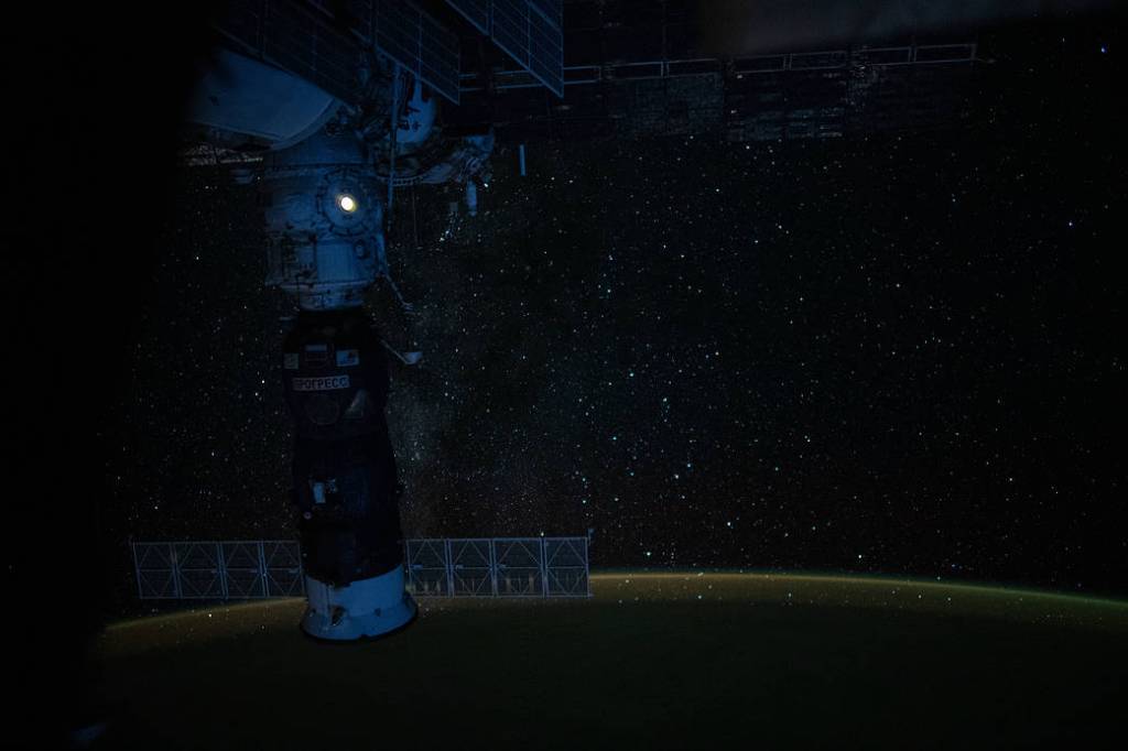 Earth’s luminous atmospheric glow back-dropped by the tranquil Milky Way