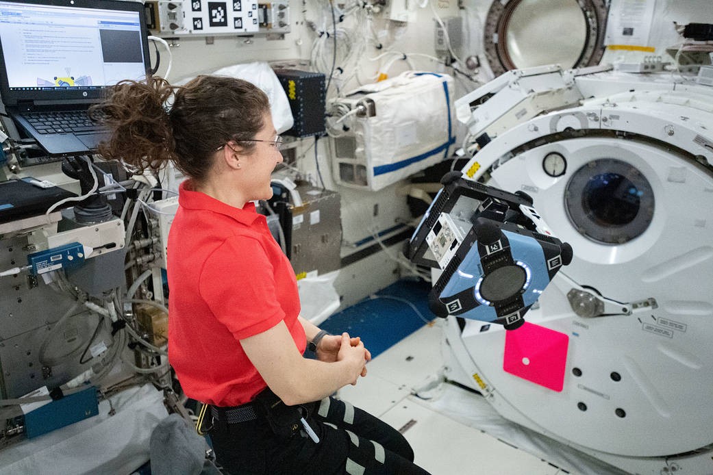 Astronaut Christina Koch tests the free-flying Astrobee