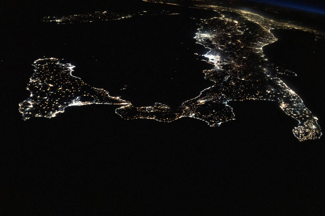 Night view of Italy and Sicily from the space station
