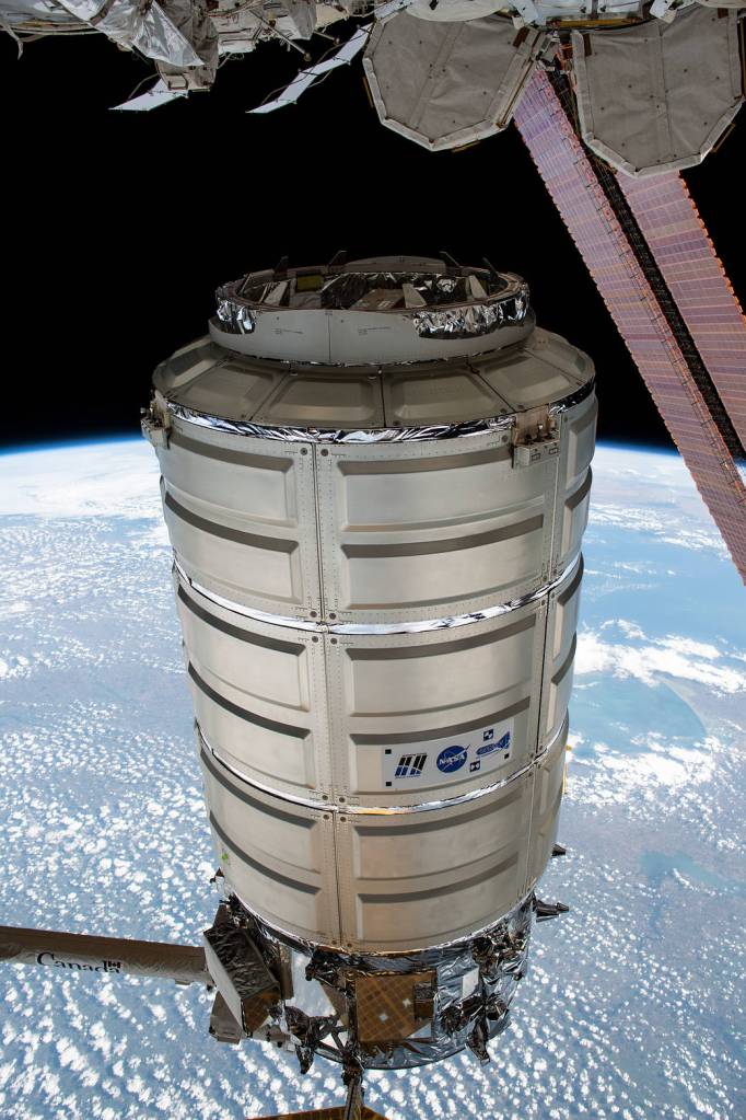 The Cygnus space freighter in the grips of the Canadarm2