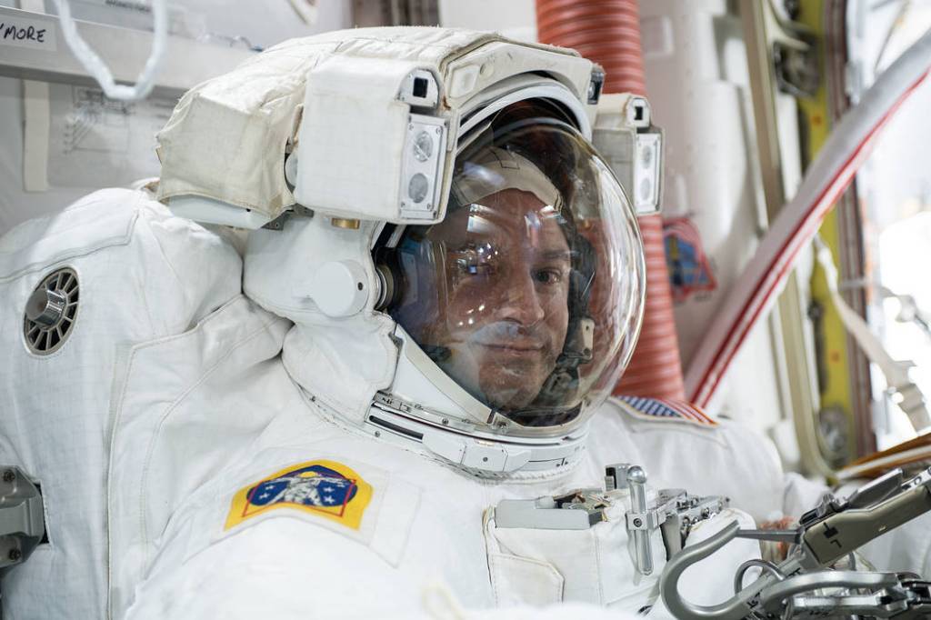NASA astronaut Andrew Morgan is suited up in a U.S. spacesuit