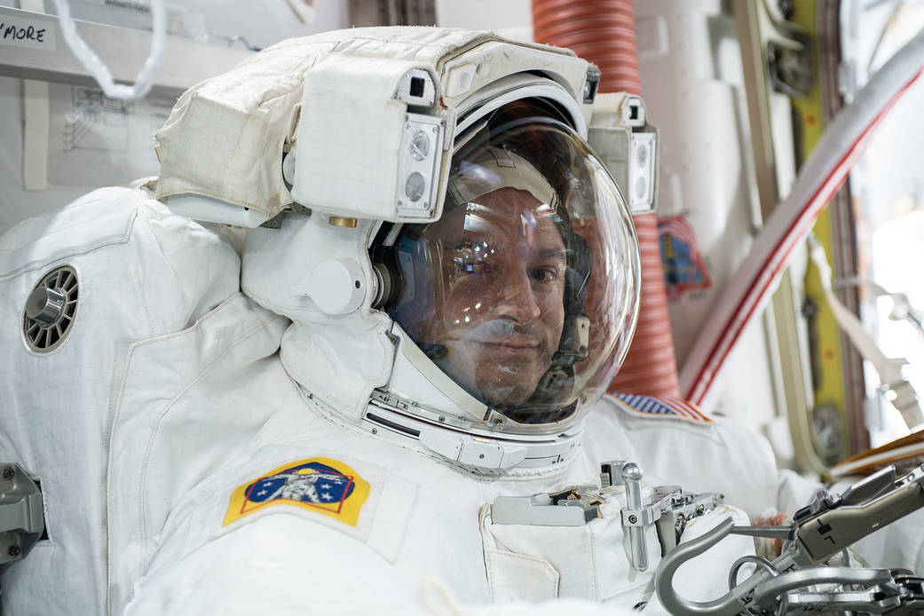 NASA astronaut Andrew Morgan is suited up in a U.S. spacesuit