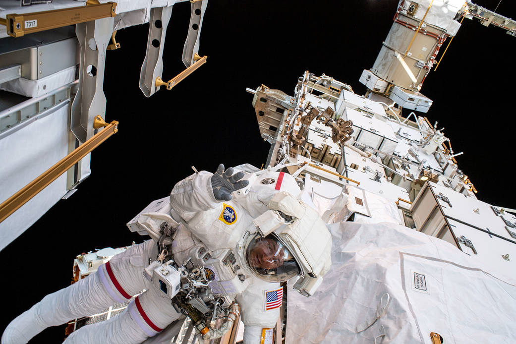 NASA astronaut Andrew Morgan waves to the camera