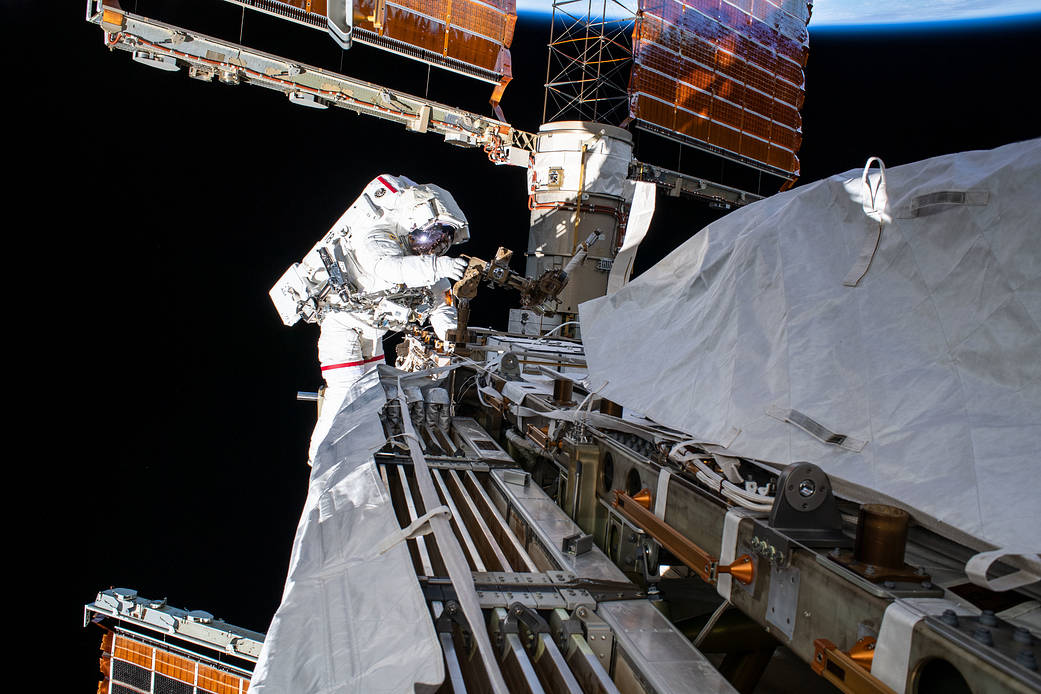 NASA astronaut Andrew Morgan works while tethered on the Port 6 truss