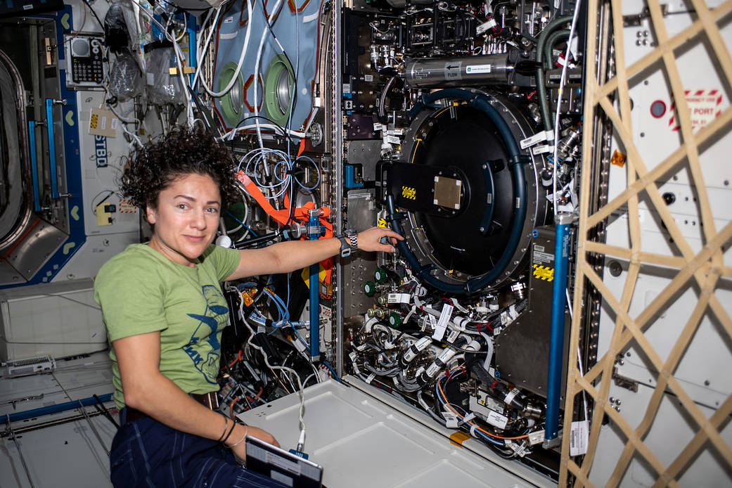 Astronaut Jessica Meir works on the Combustion Integrated Rack
