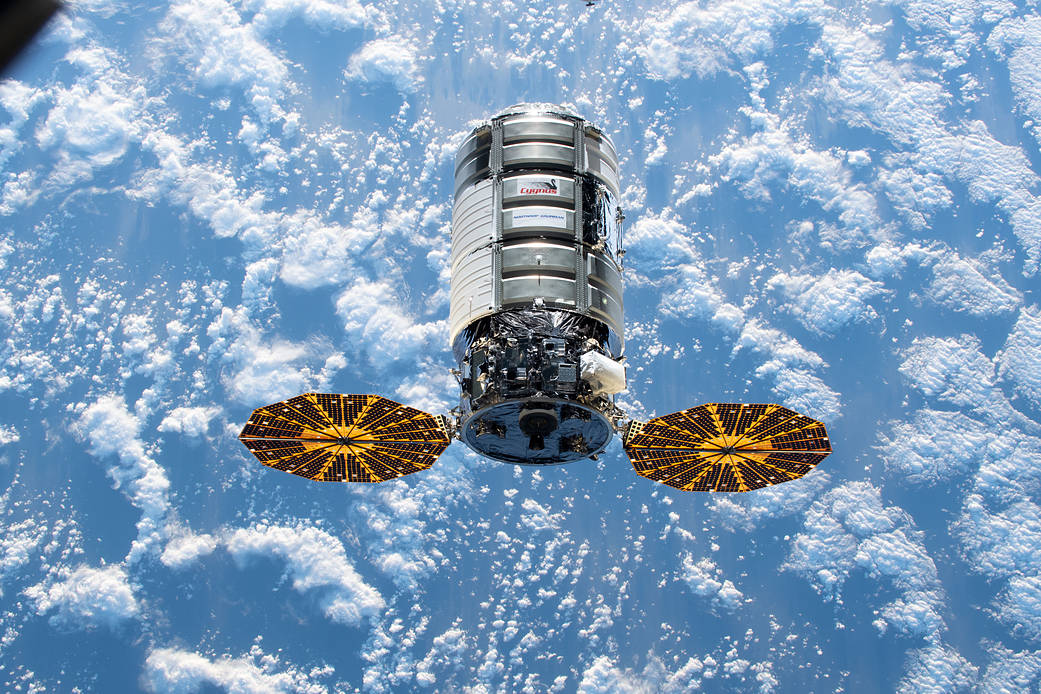 The Cygnus space freighter approaches the space station