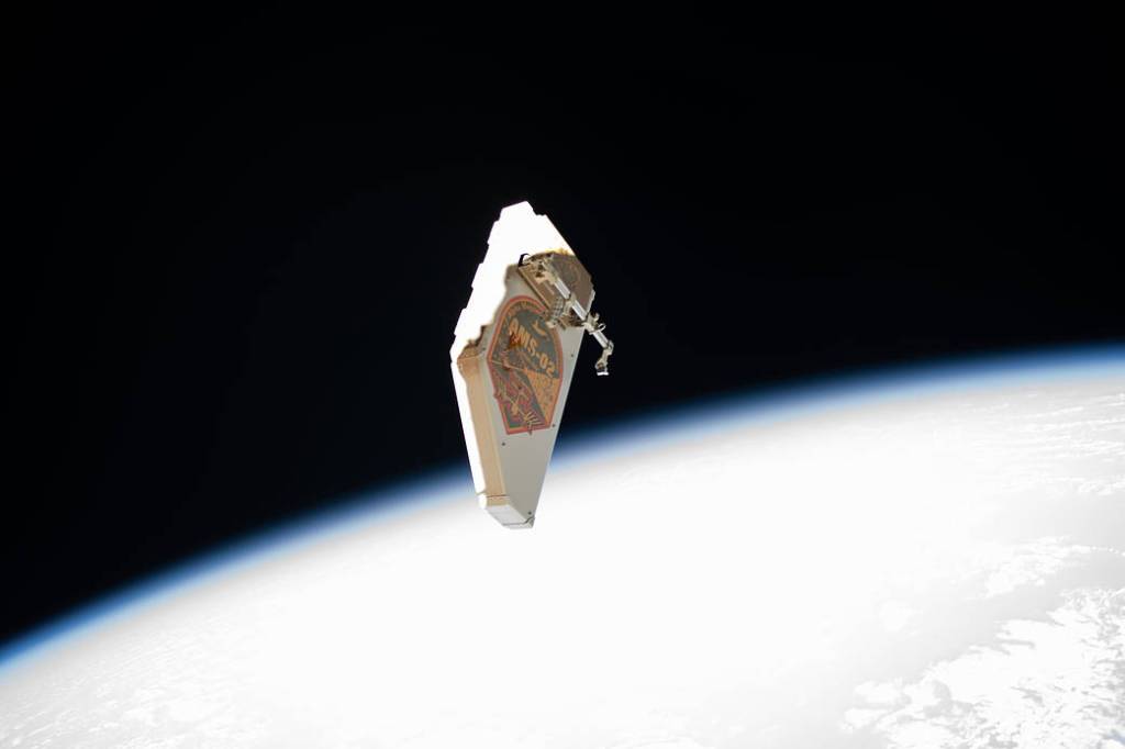 The Alpha Magnetic Spectrometer’s debris shield drifts away