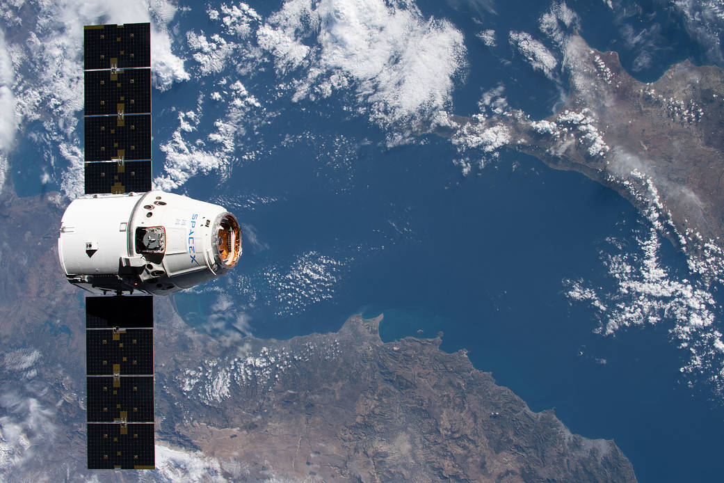 The SpaceX Dragon approaches the station over the Mediterranean Sea