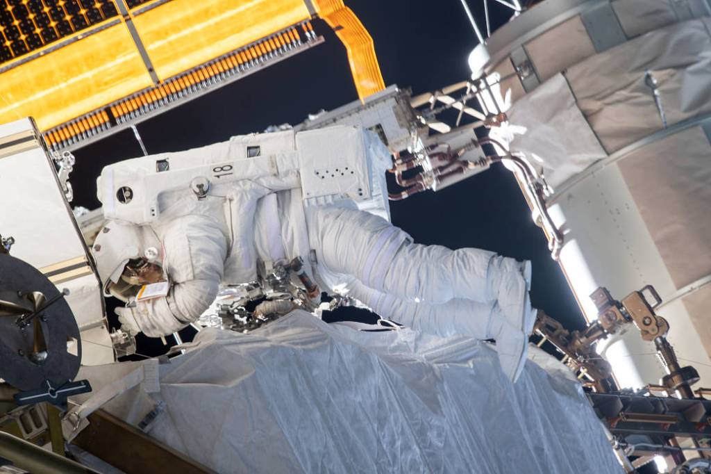 Spacewalker Christina Koch is tethered to the International Space Station