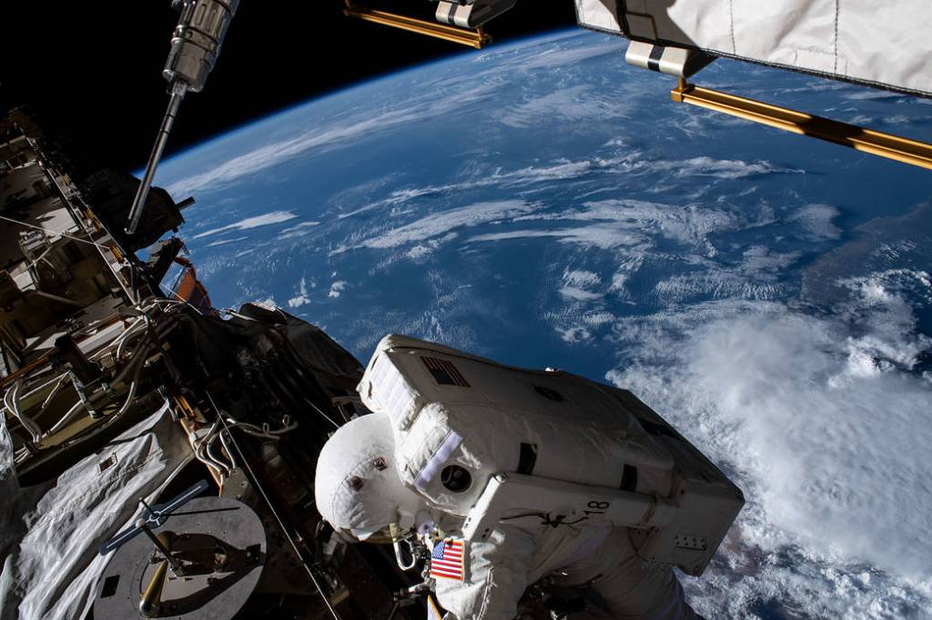 Spacewalker Christina Koch works 265 miles above the Atlantic Ocean