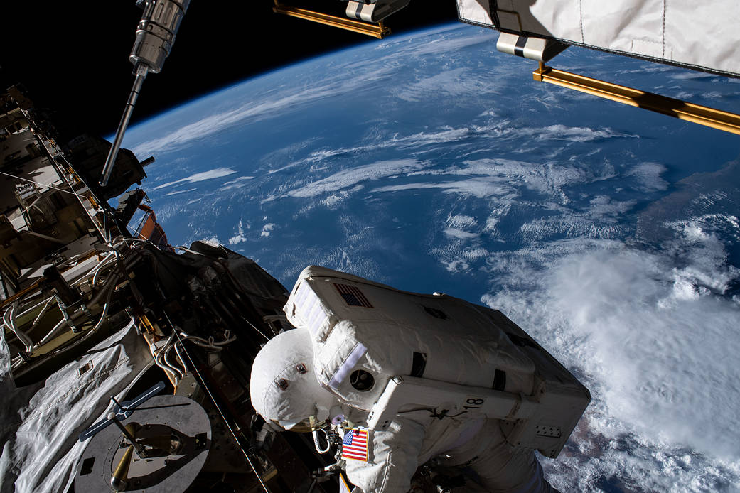 Spacewalker Christina Koch works 265 miles above the Atlantic Ocean
