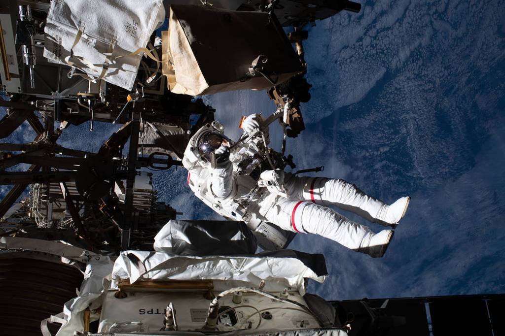 NASA astronaut Andrew Morgan is tethered to the space station