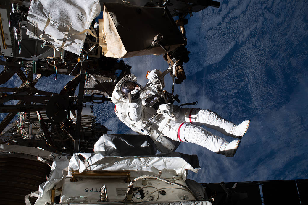 NASA astronaut Andrew Morgan is tethered to the space station