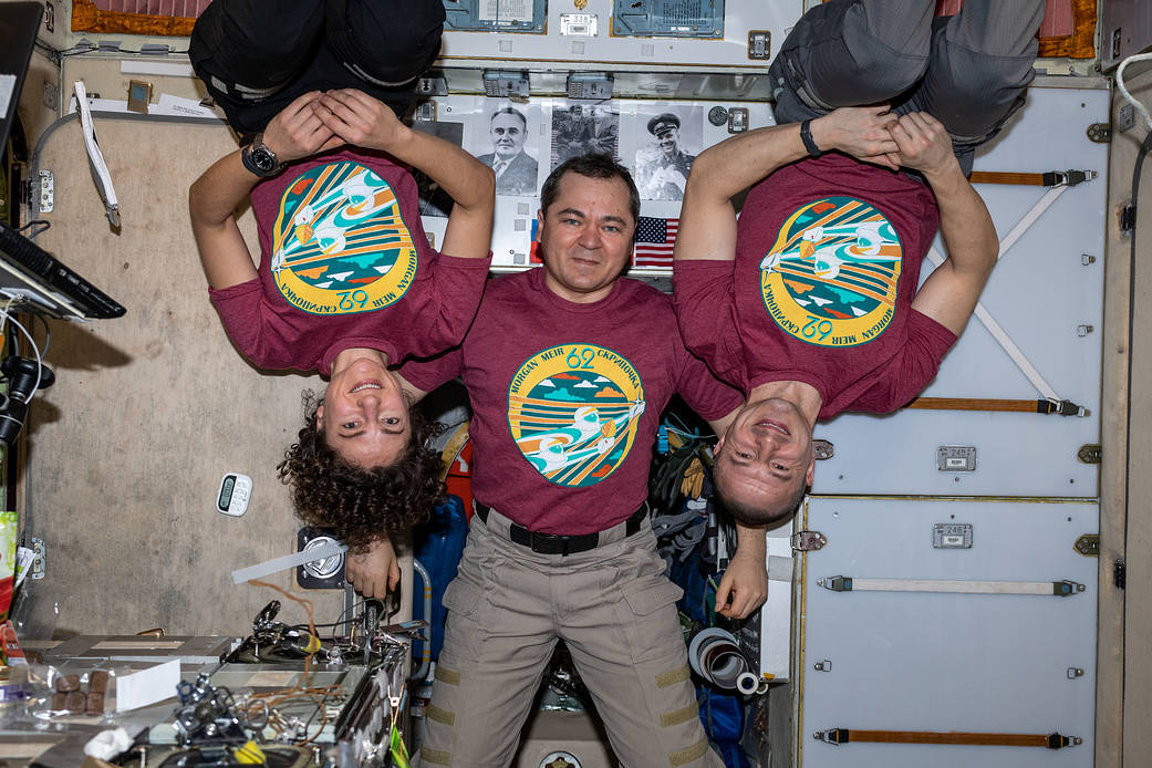 The three-member Expedition 62 crew