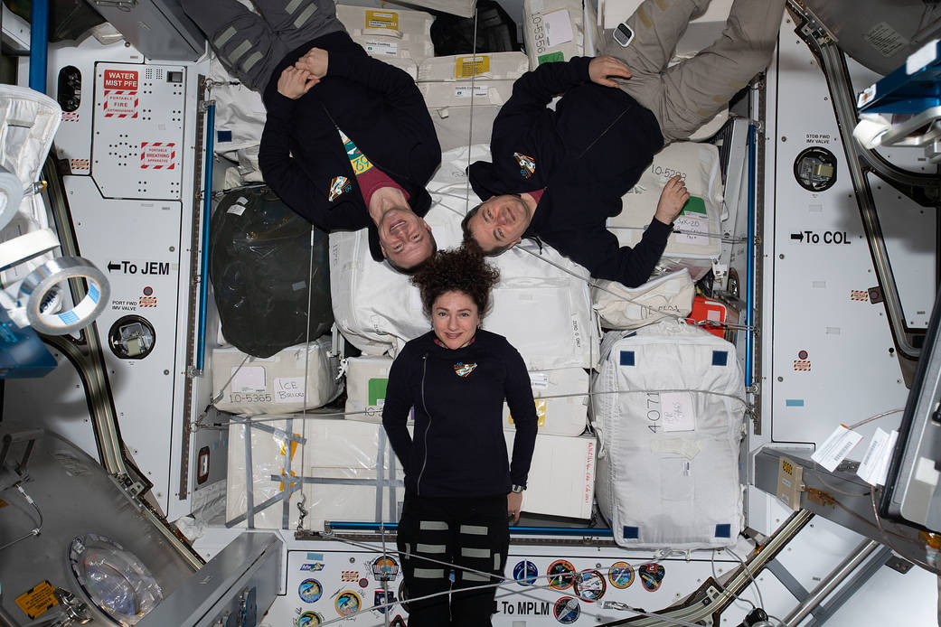 The Expedition 62 crew poses for a portrait inside the Harmony module