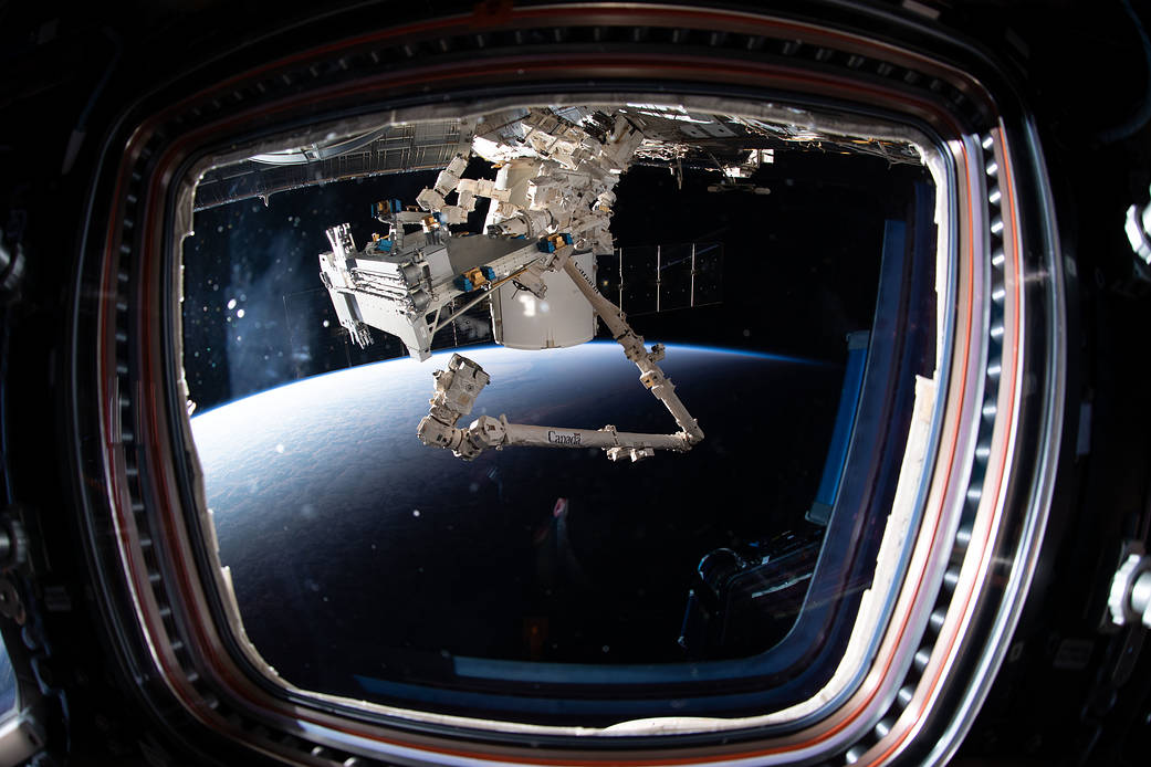 The Canadarm2 robotic arm and Dextre extract Bartolomeo