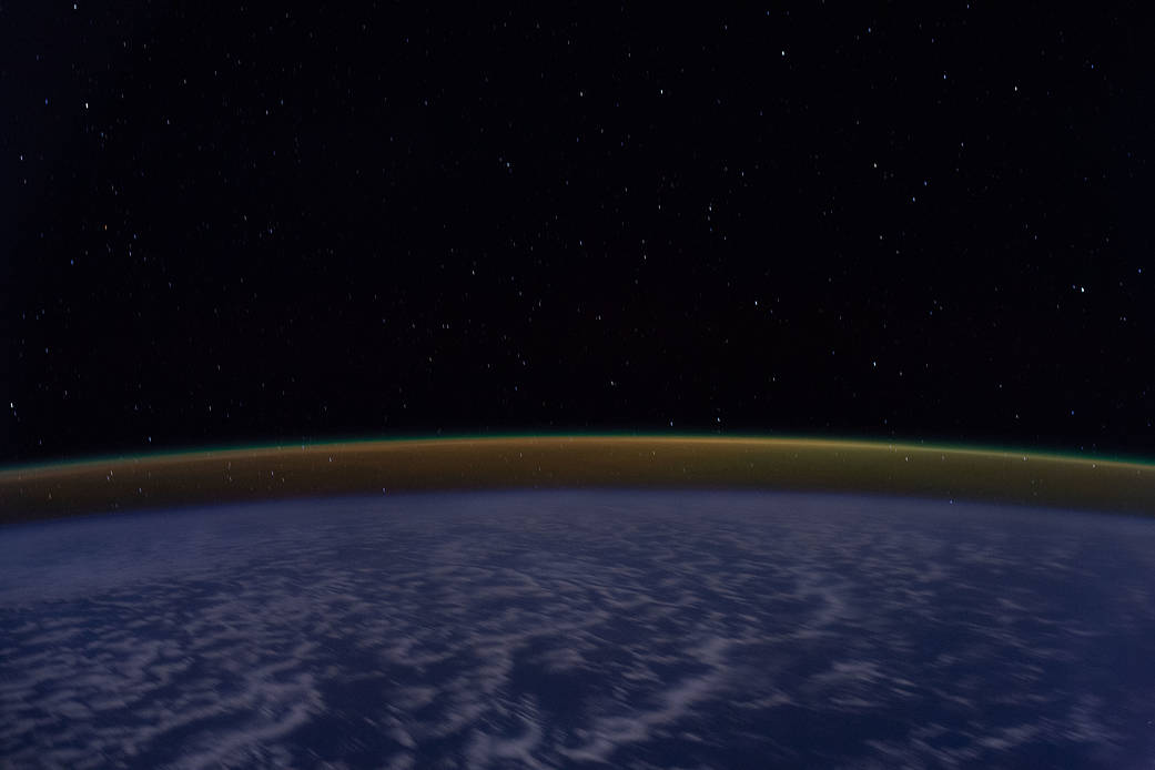 The Earth's glow blankets the horizon
