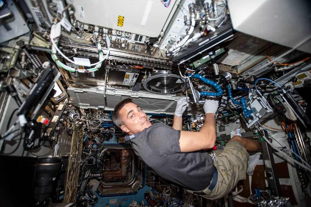 Commander Chris Cassidy works in the Combustion Integrated Rack