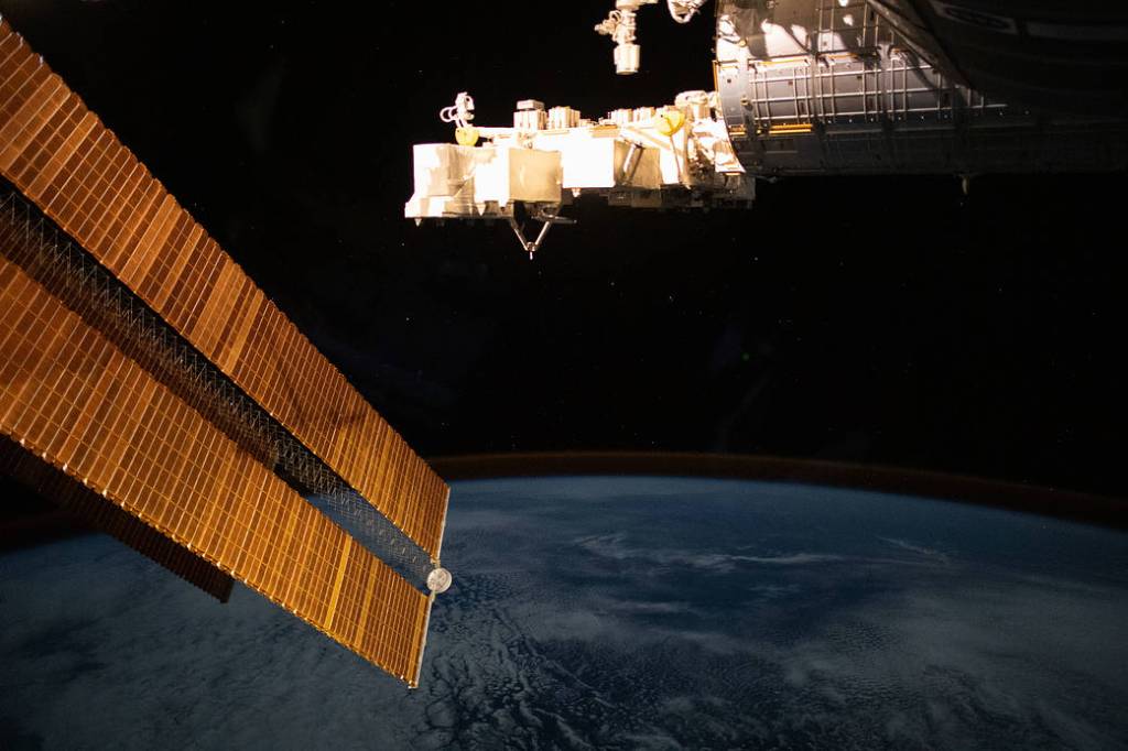 The wispy atmospheric layer of the air glow crowns the Earth’s horizon