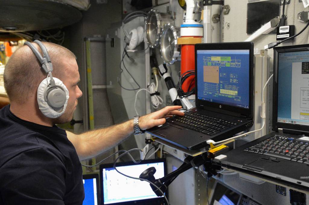 Flight Engineer Ivan Vagner practices a simulated emergency