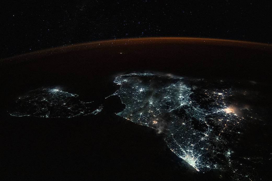 The island nation of Sri Lanka and the brightly-lit southern tip of India