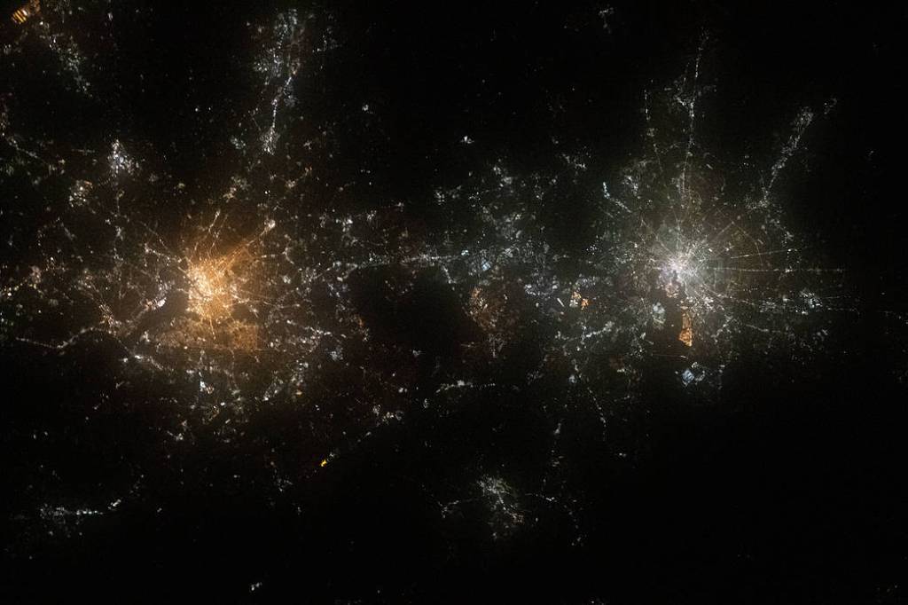The well-lit cities of Washington, D.C. and Baltimore, Maryland