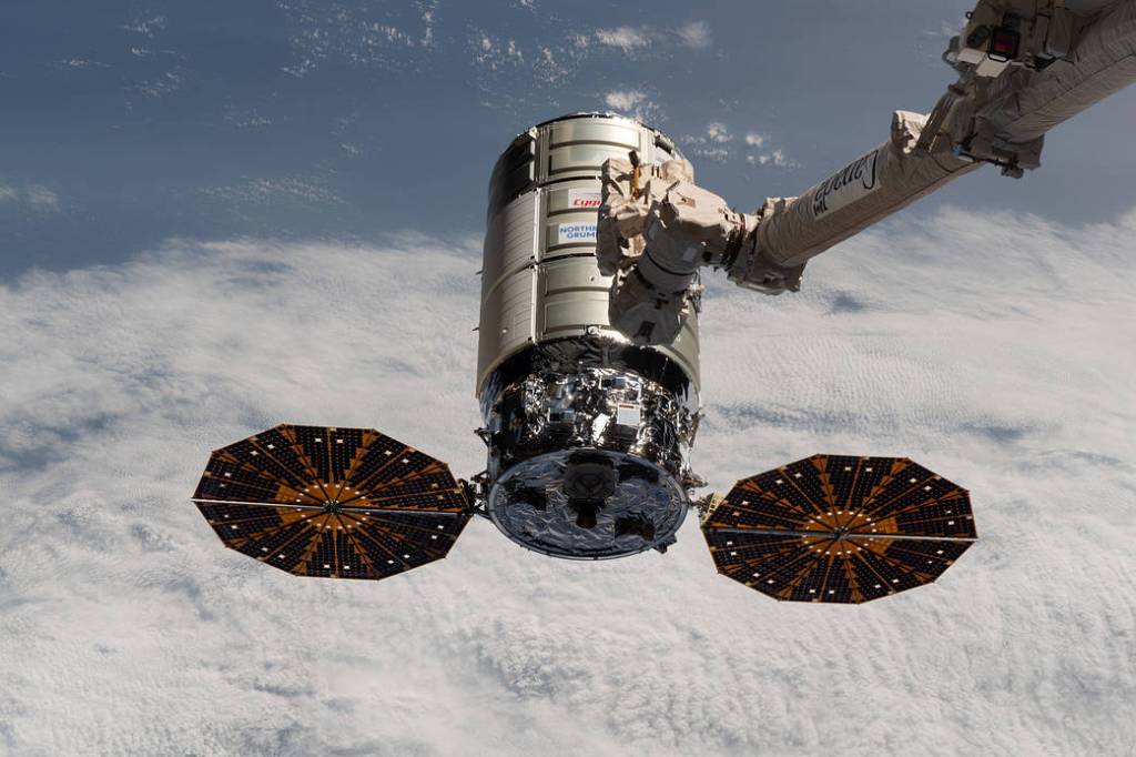 The Cygnus space freighter approaches the space station