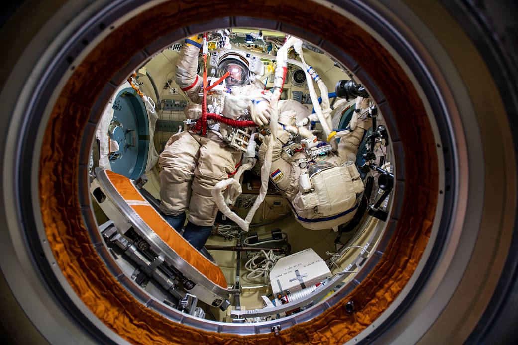 Expedition 64 cosmonauts in Russian Orlan spacesuits