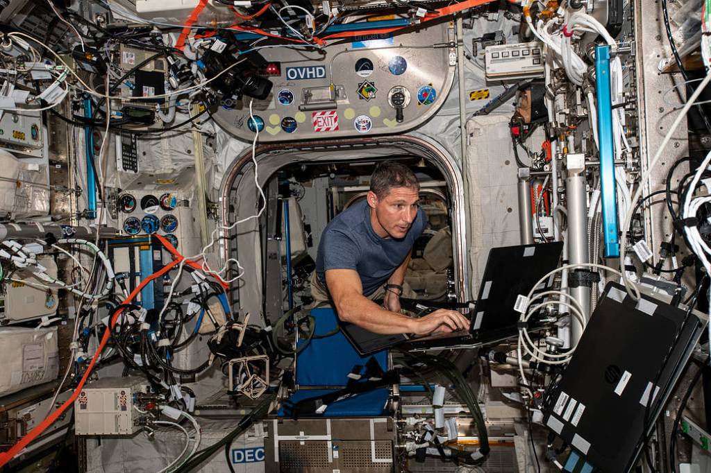 Expedition 64 Flight Engineer Michael Hopkins works on the Grasp experiment