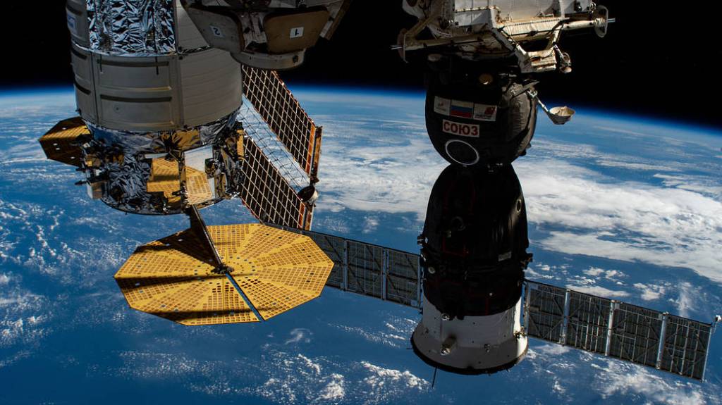 The U.S. Cygnus cargo craft and Russia’s Soyuz crew ship