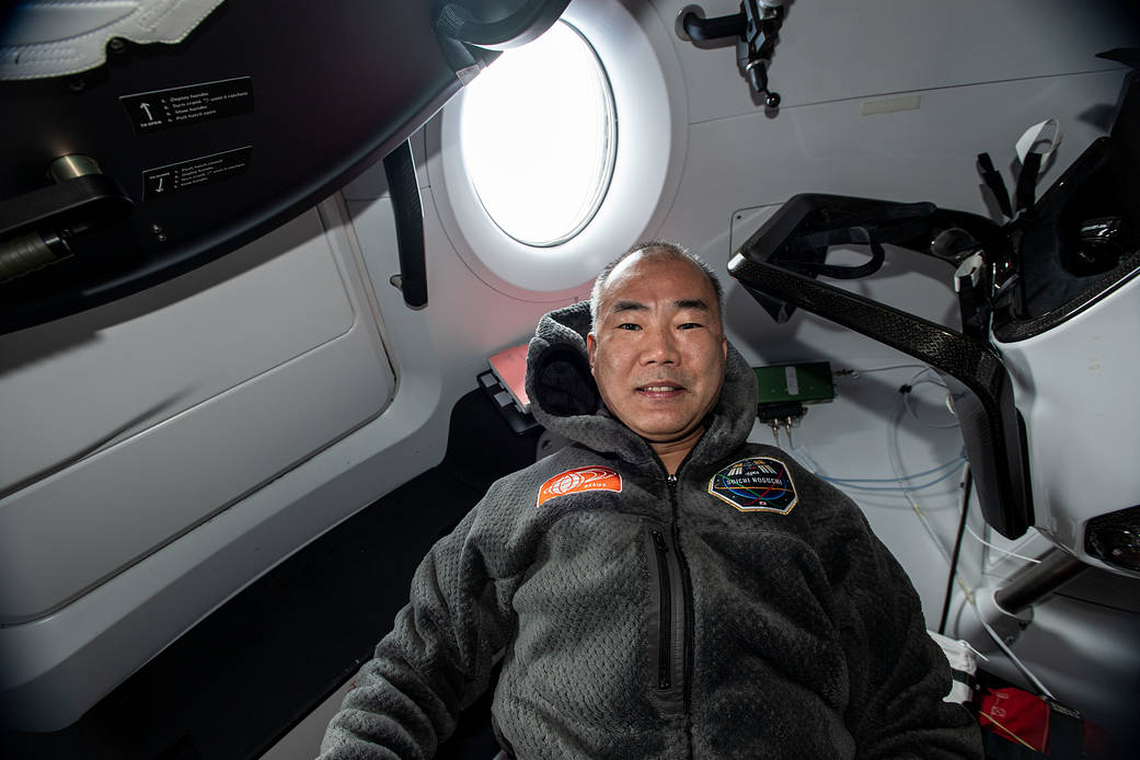 JAXA astronaut Soichi Noguchi inside the SpaceX Crew Dragon