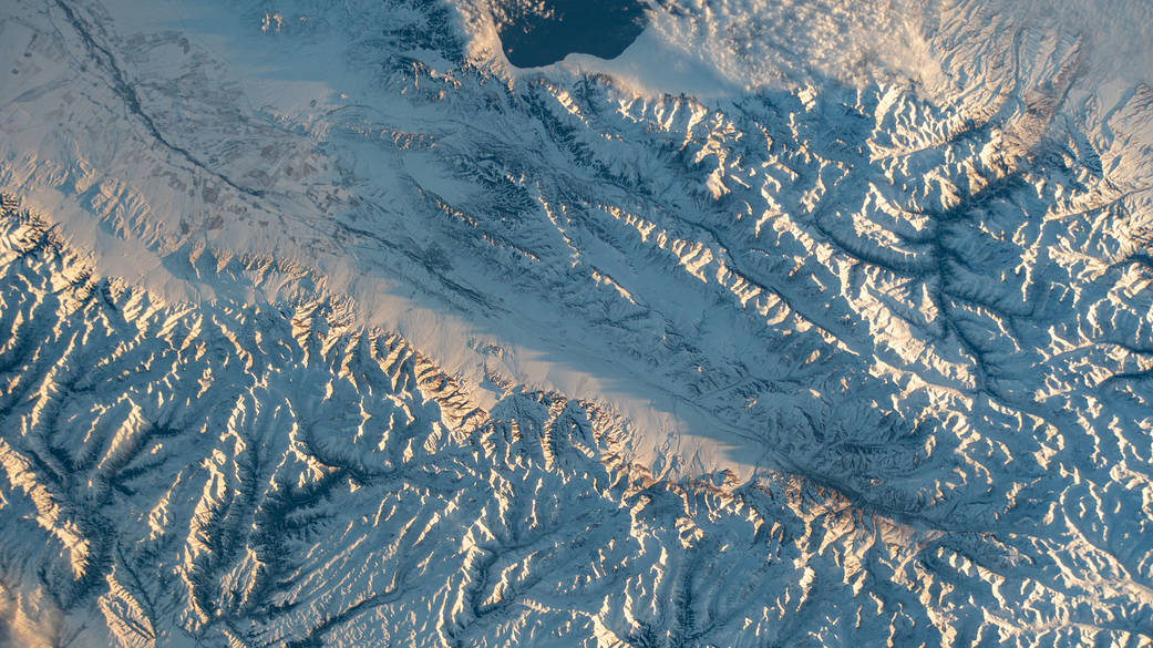 Snow-covered mountains along the Kazakhstan-China border