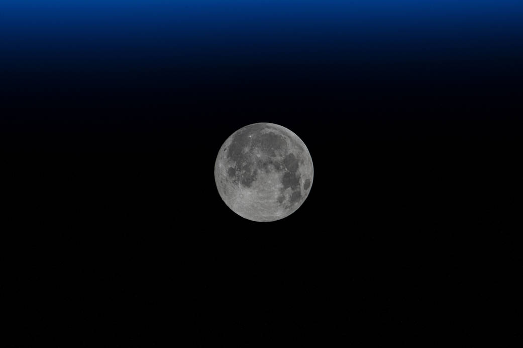 The waxing gibbous Moon is pictured from the space station