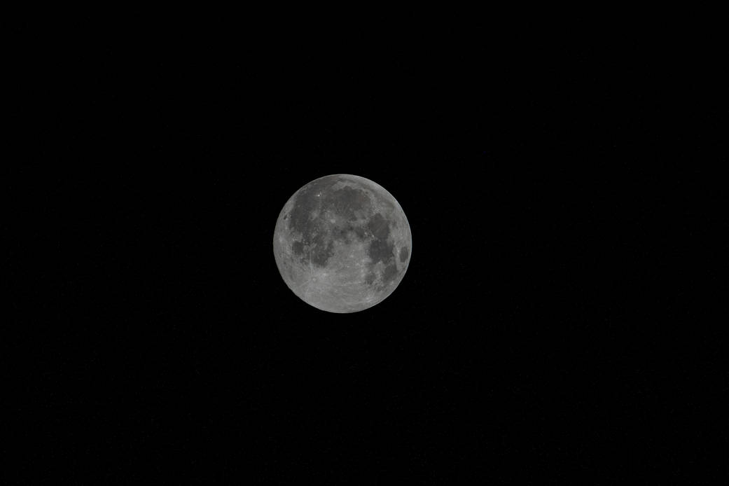 The waxing gibbous Moon is pictured from the space station