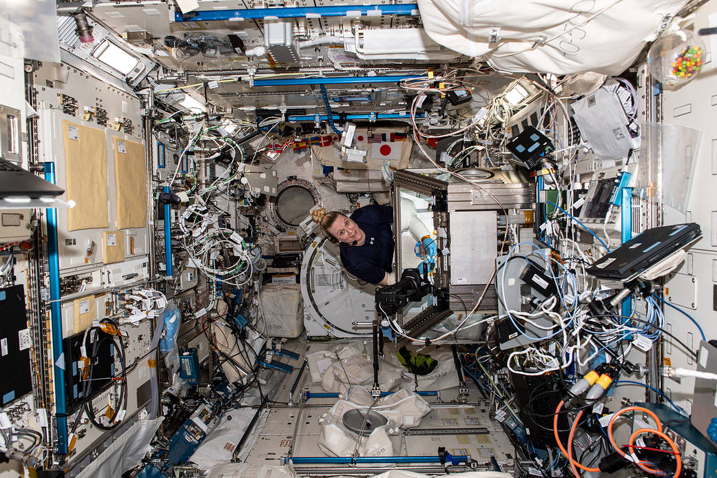 Astronaut Kate Rubins works inside the Kibo laboratory module