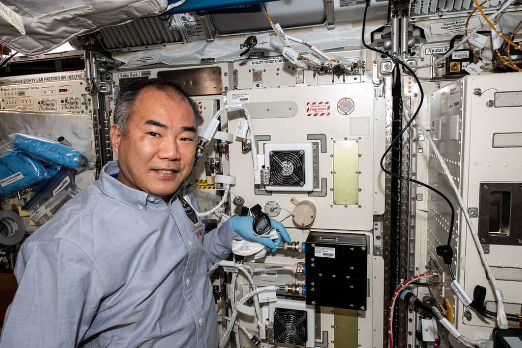 JAXA astronaut Soichi Noguchi works in the Kibo lab module