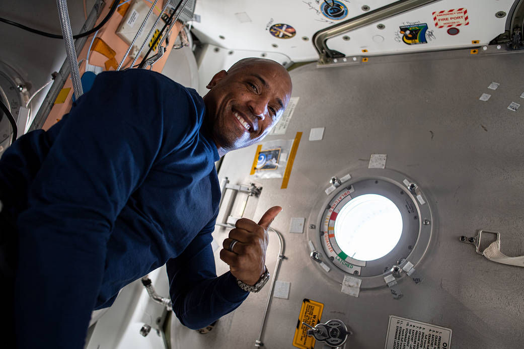 NASA astronaut Victor Glover gives a "thumbs up"