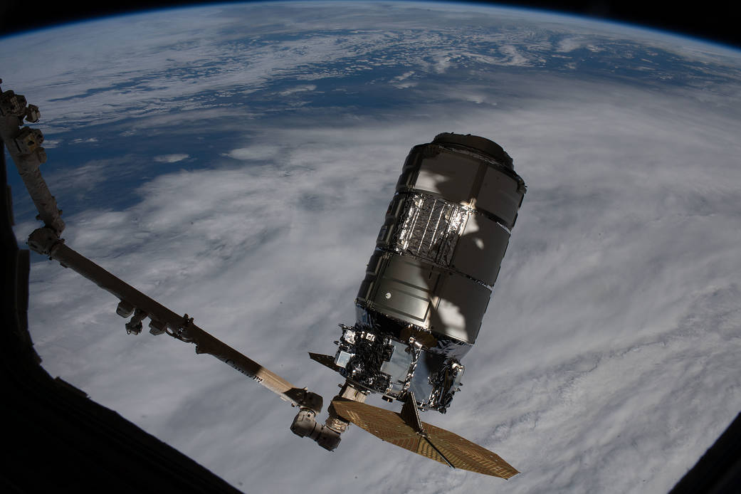 The Cygnus space freighter is pictured before its release