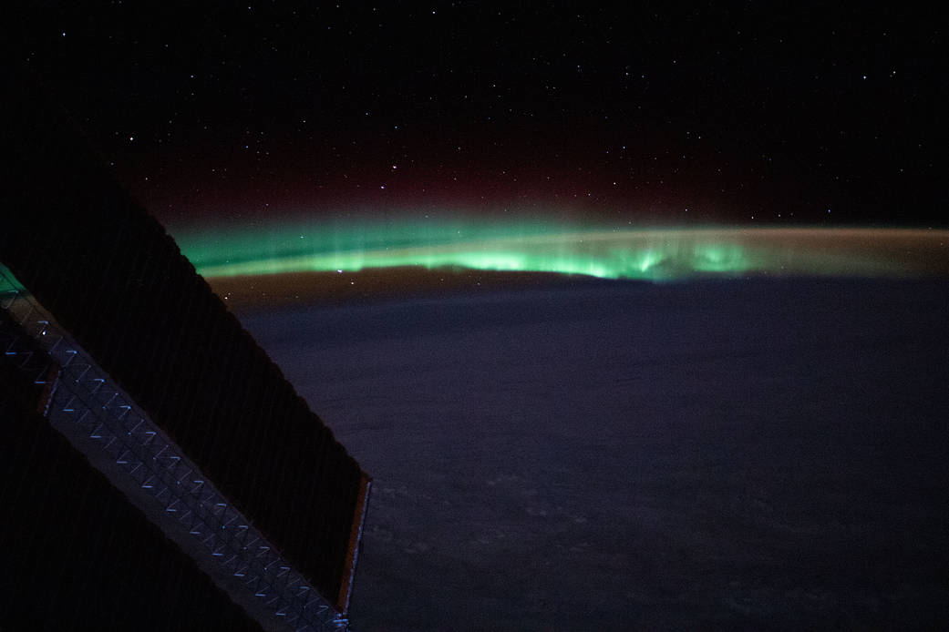 Earth's atmospheric glow and the aurora