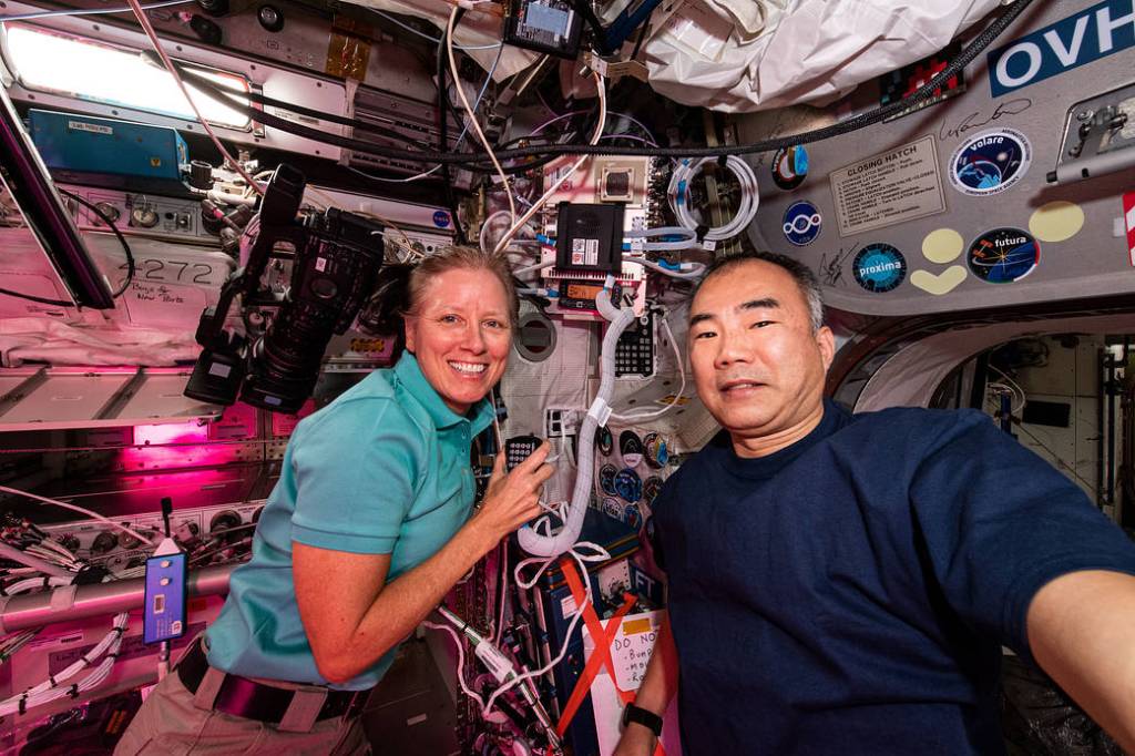 Astronauts Shannon Walker of NASA and Soichi Noguchi of JAXA