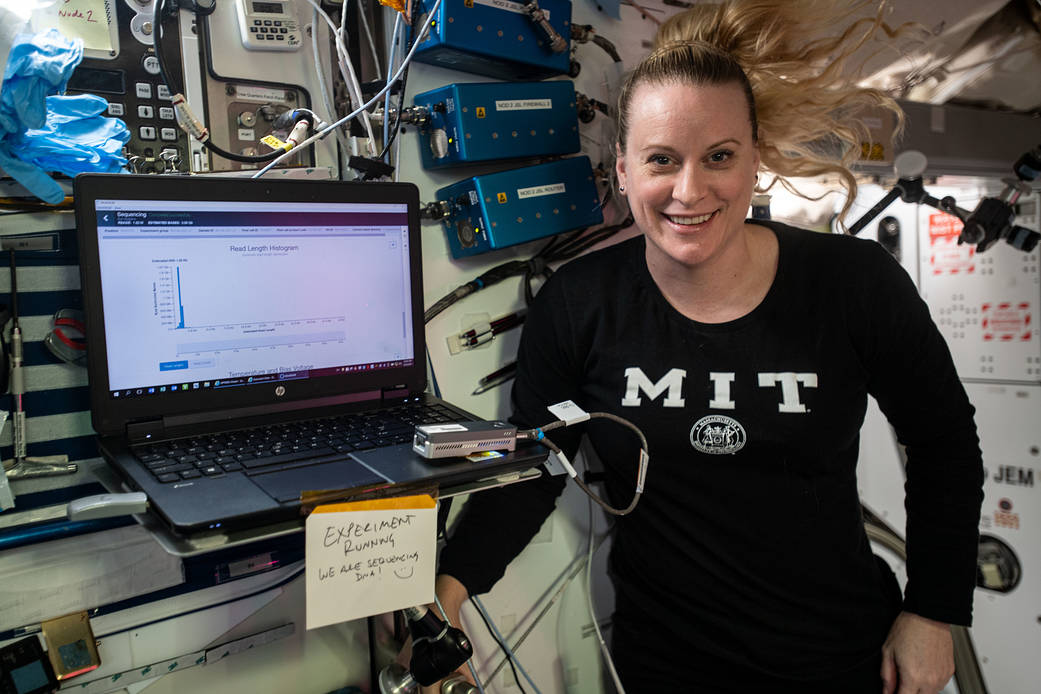 Astronaut Kate Rubins is pictured sequencing DNA