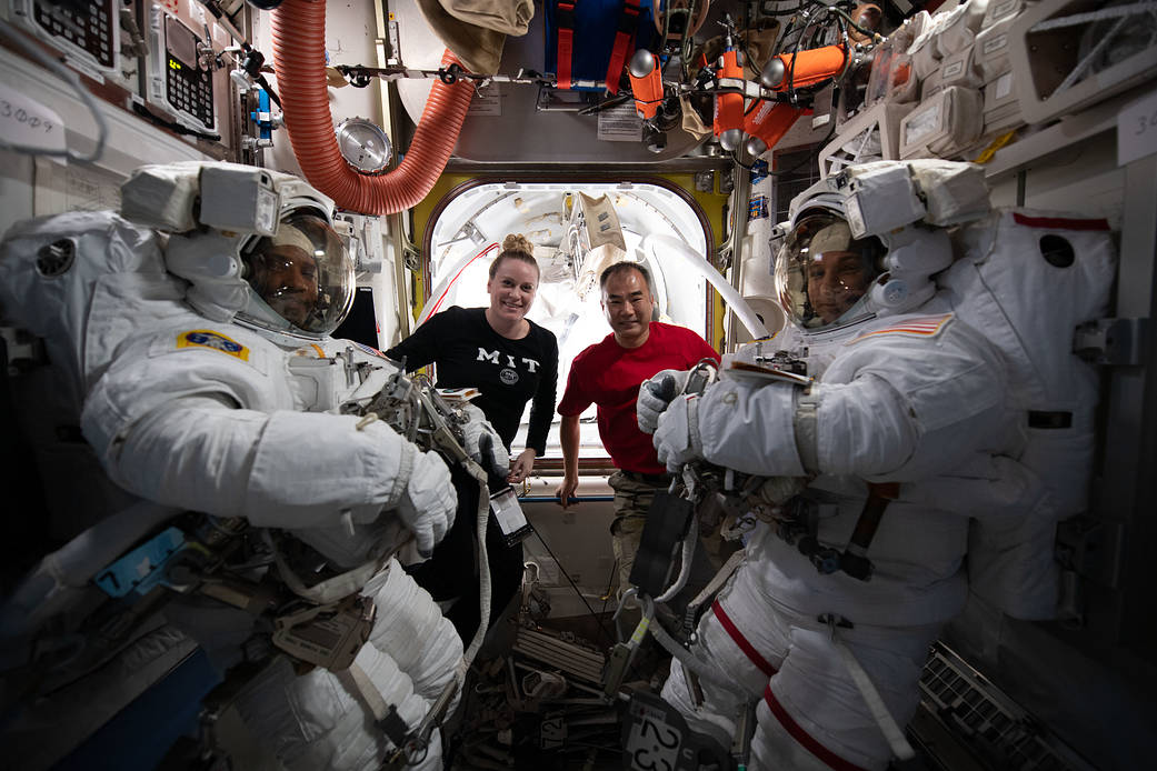 Team portrait during spacewalk preparations
