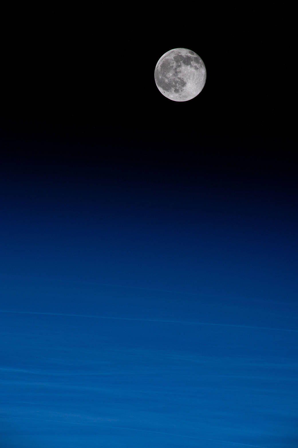 The waning gibbous moon above China