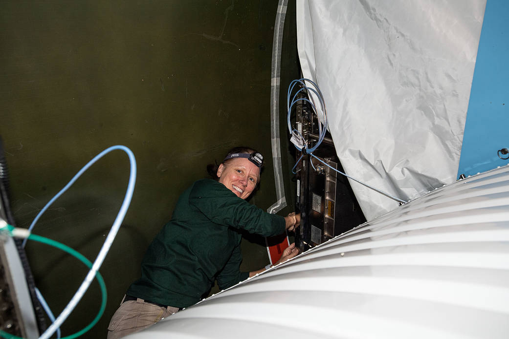 Astronaut Shannon Walker works on communications maintenance